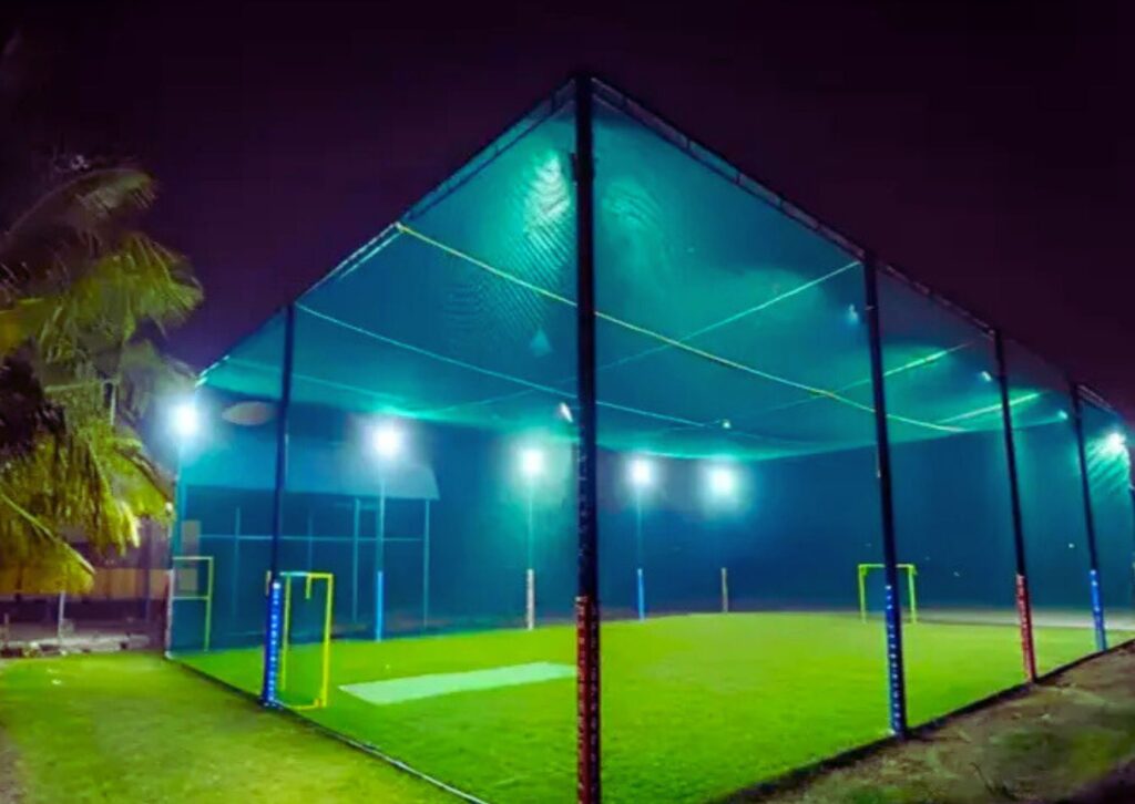 outdoor cricket practice nets installation with turf
